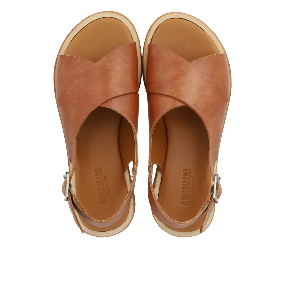 Cross sandal with buckle closure